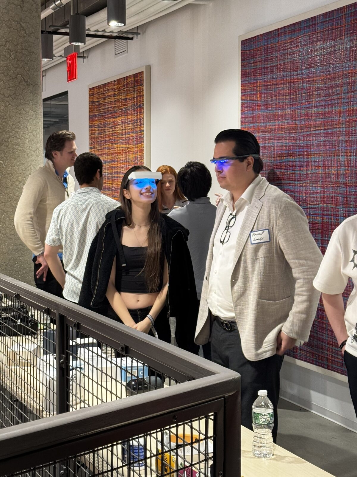 Attendees with light-therapy gear at a TFBL event
